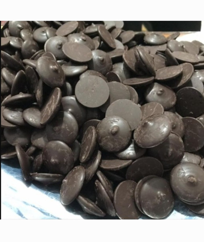 شکلات سکه ای تلخ سوربن کاله ۱۰۰ گرمی(بسته بندی فروشگاهی) (با توجه به گرمای هوا، مسئولیت هرگونه تغییر در بافت یا شکل محصول بر عهده خریدار است)